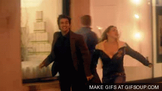 Rose and Tenth Doctor running and laughing